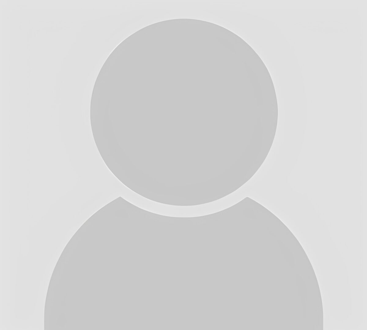 Default profile silhouette on gray background.